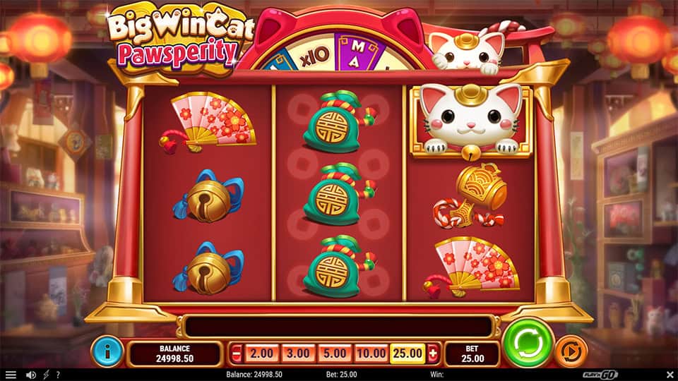 Big Win Cat Pawsperity slot grid with bells, fans, lucky charms and waving cat symbols.
