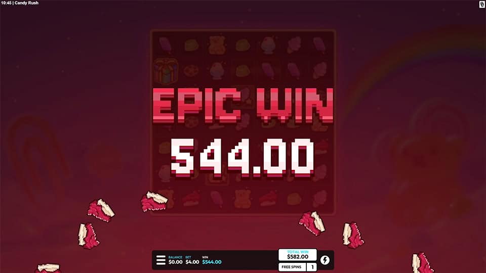 Epic win screen in Candy Dash slot with pink pixel-style text and cake slices falling across the screen.
