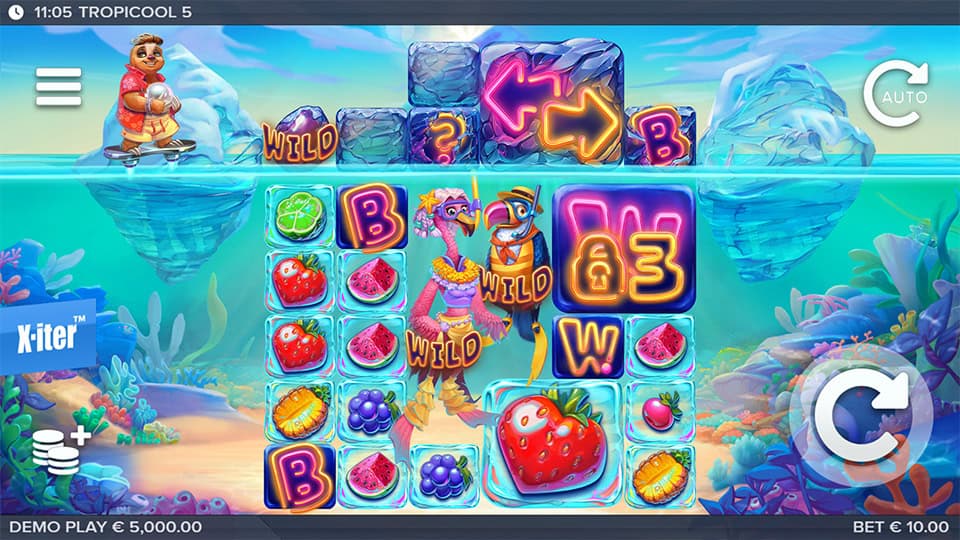 Base gameplay screen of Tropicool 5 slot showing tropical fruit symbols, wilds, and characters on a vibrant oceanic grid.