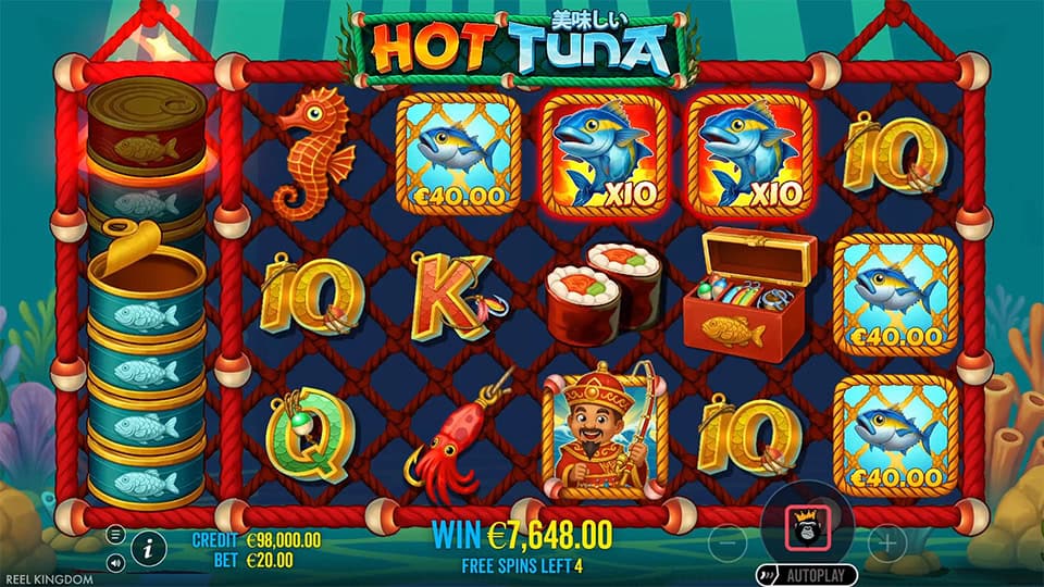 Free spins round in Hot Tuna slot showing fisherman character collecting multiplier fish symbols in front of a stacked tuna grid.