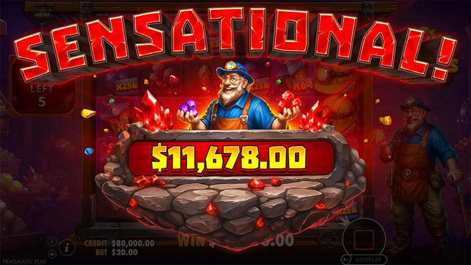 “SENSATIONAL!” lights up in bold red above the miner holding glowing gems, with explosions of crystals and coins in the background.