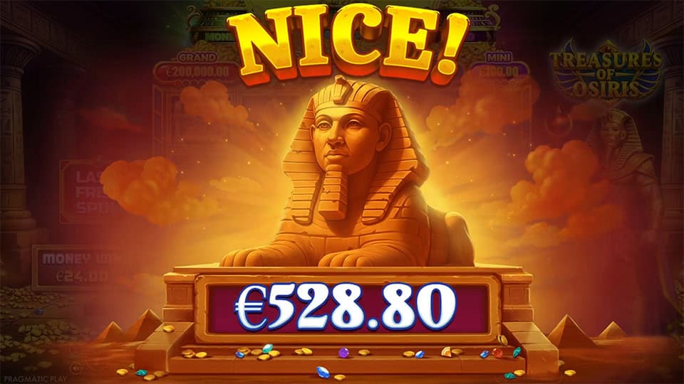 A glowing Sphinx statue in the spotlight with the word “NICE!” above a golden reward box, scattered gems adding to the celebration.