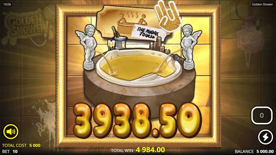 Golden bathtub with fountains pouring liquid gold, framed by cherubs and a sign reading &ldquo;The Midas Touch,&rdquo; showcasing a big win moment.
