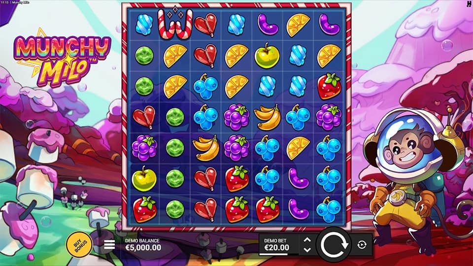 Main grid packed with fruit and candy symbols like strawberries, bananas and heart sweets beside the space-suited Milo character.