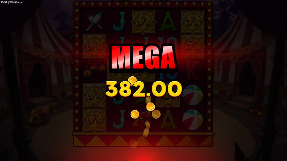 Mega win screen in Wild Circus slot with golden coin shower and bold red and yellow win text over the reels at night.
