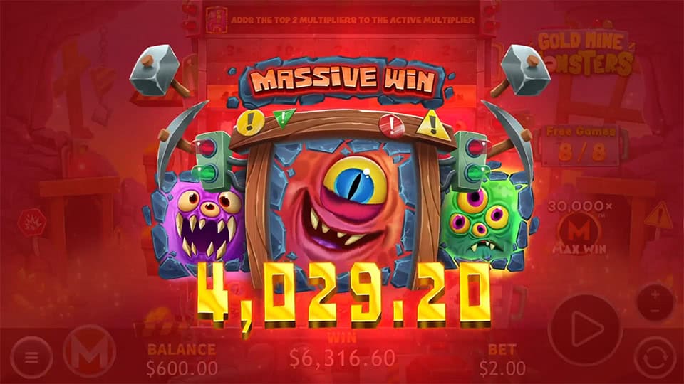 Bright red &ldquo;MASSIVE WIN&rdquo; banner smashing onto the screen with three wild-eyed monsters and explosive warning lights.